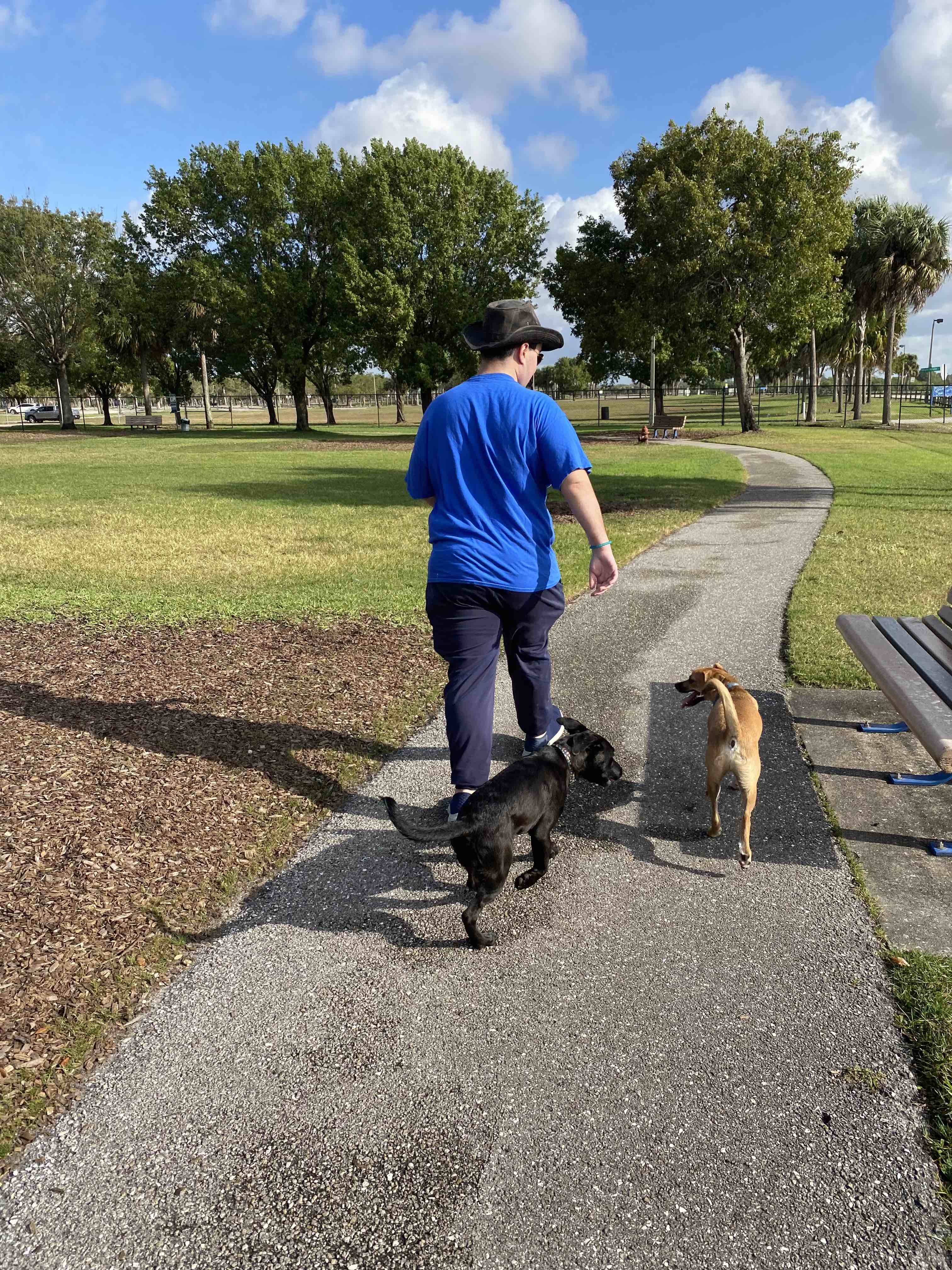 Caregiver outdoors with client